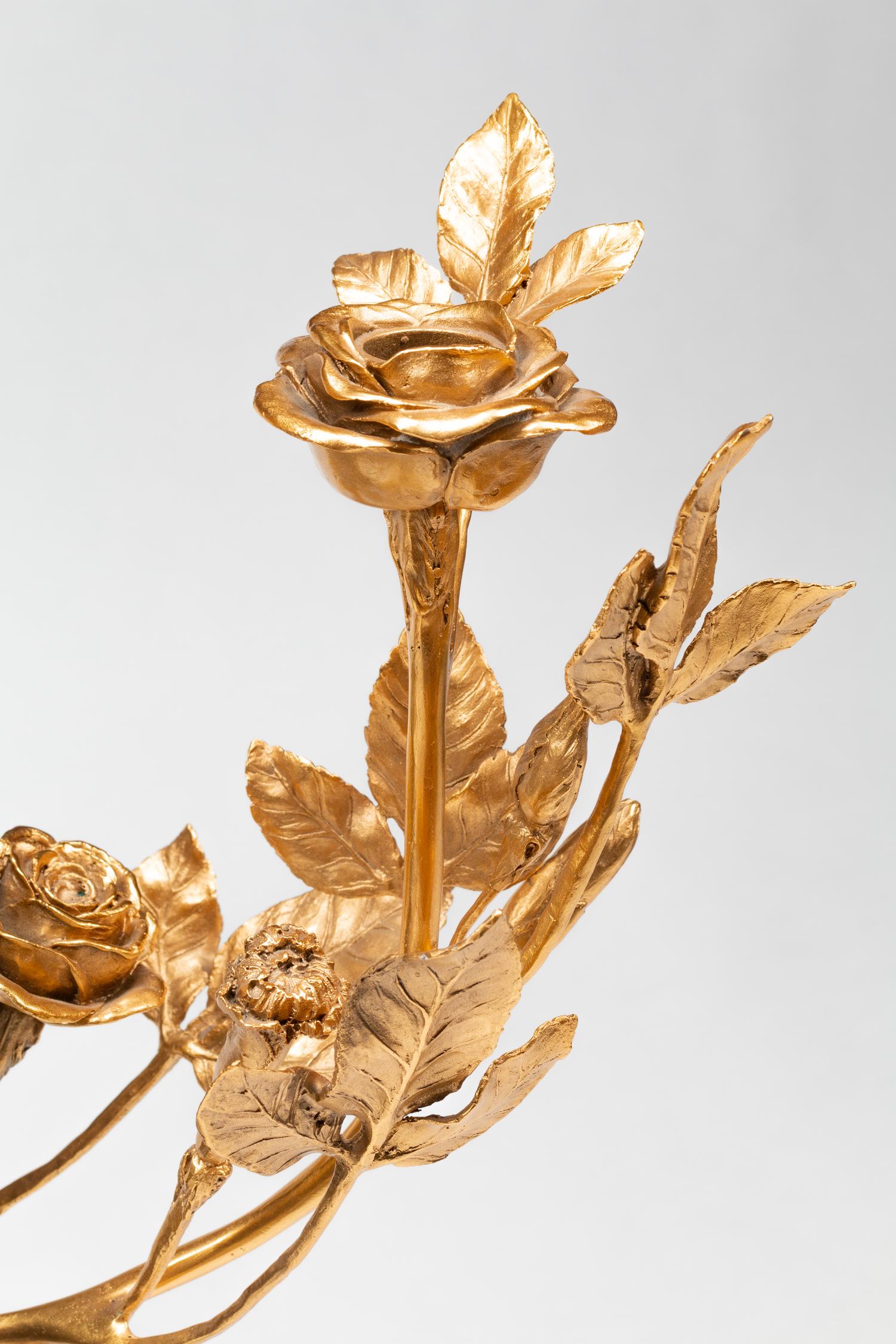 A Pair of French Gilt and Patinated Bronze and Marble Figural Three-Light Candelabra