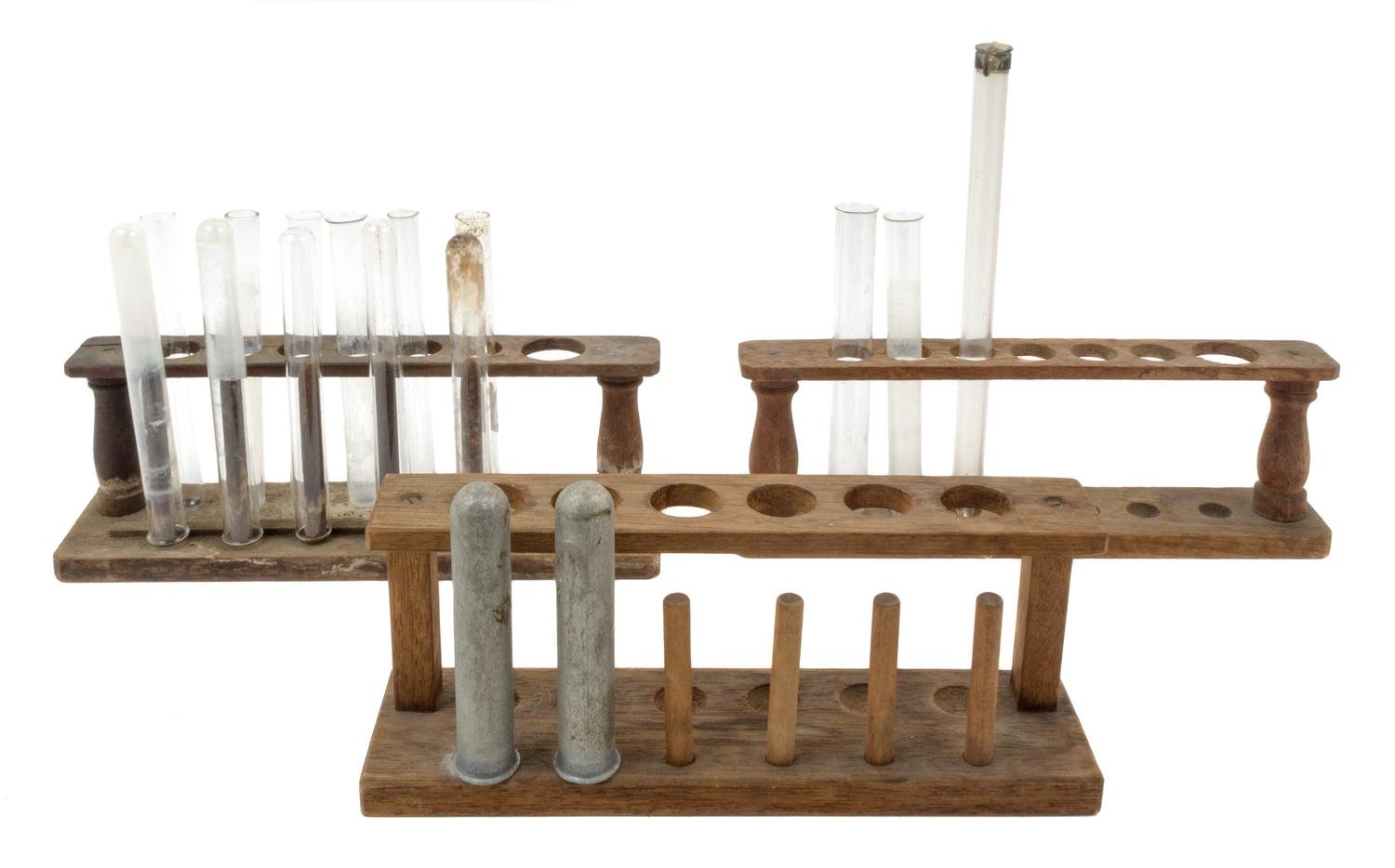 A Group of Glass Test Tubes and Racks Width of widest rack 11 inches.