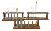 A Group of Glass Test Tubes and Racks Width of widest rack 11 inches.