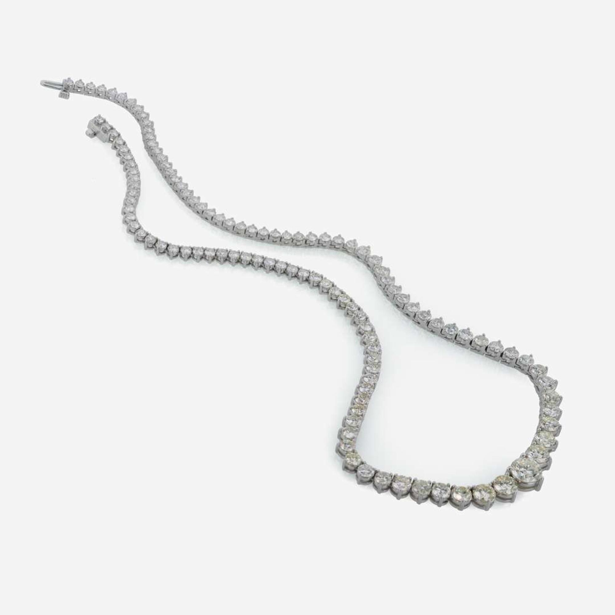 A Diamond and 18K White Gold Rivière Style Necklace 20.00 Carats