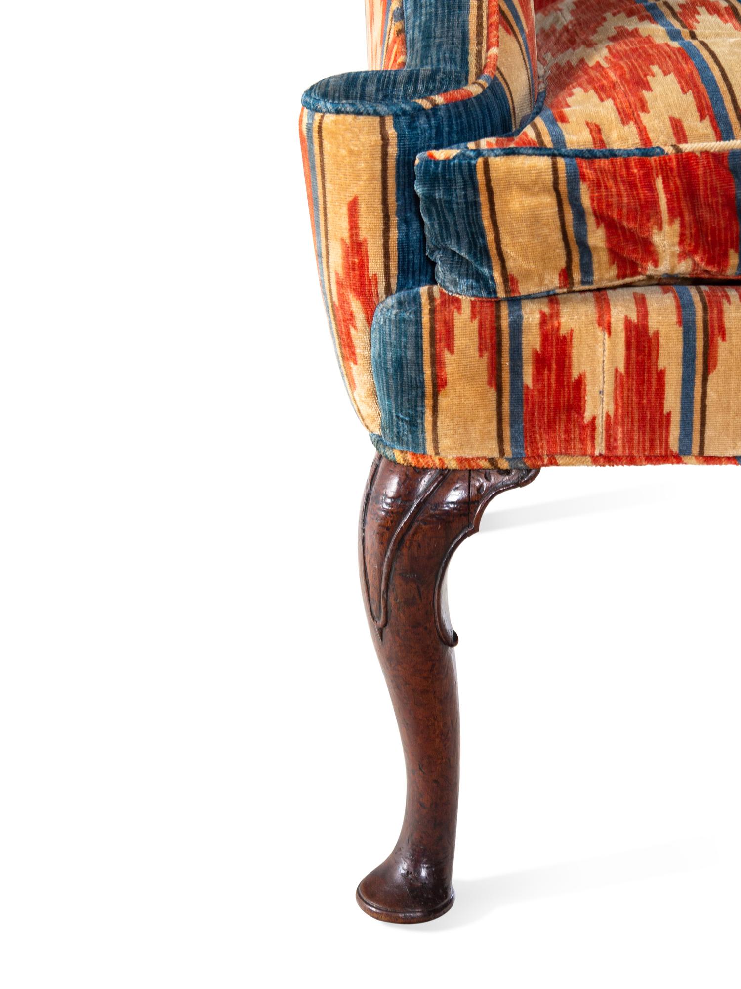 A George II Carved Walnut Sofa