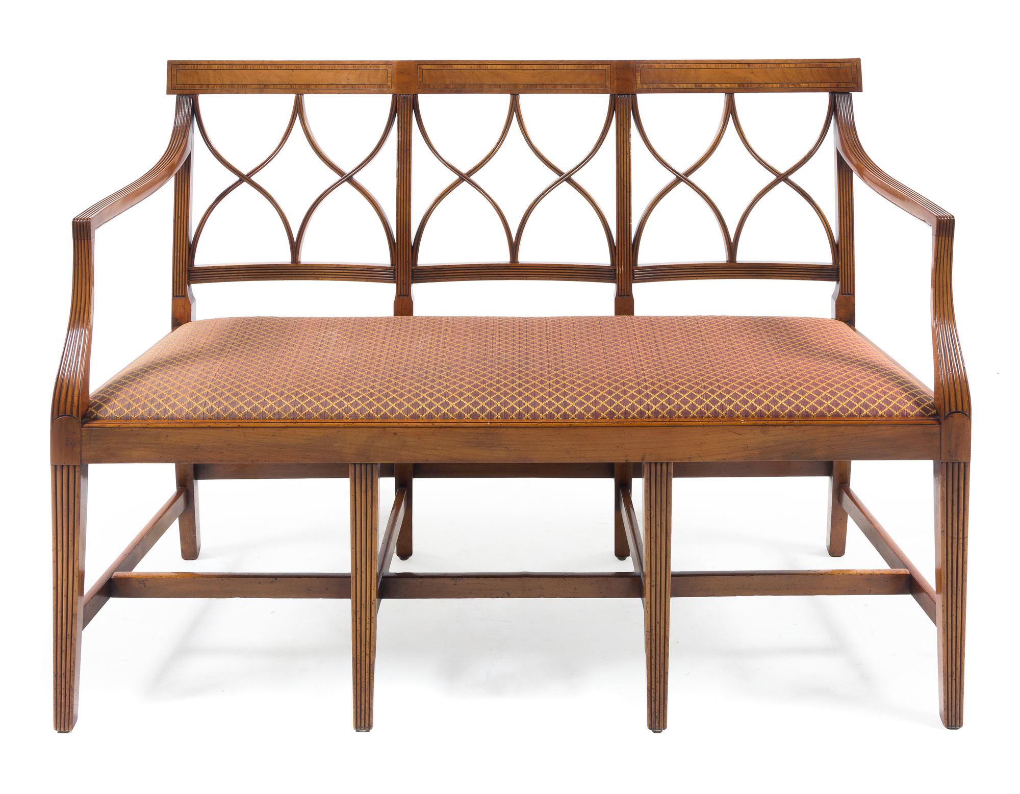 A Sheraton Style Mahogany and Satinwood Bench Height 34 3/4 x width 52 x depth 20 1/2 inches. — 20TH CENTURY