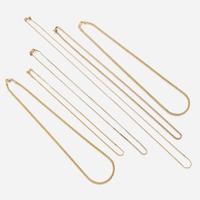 A collection of six fourteen karat gold necklaces