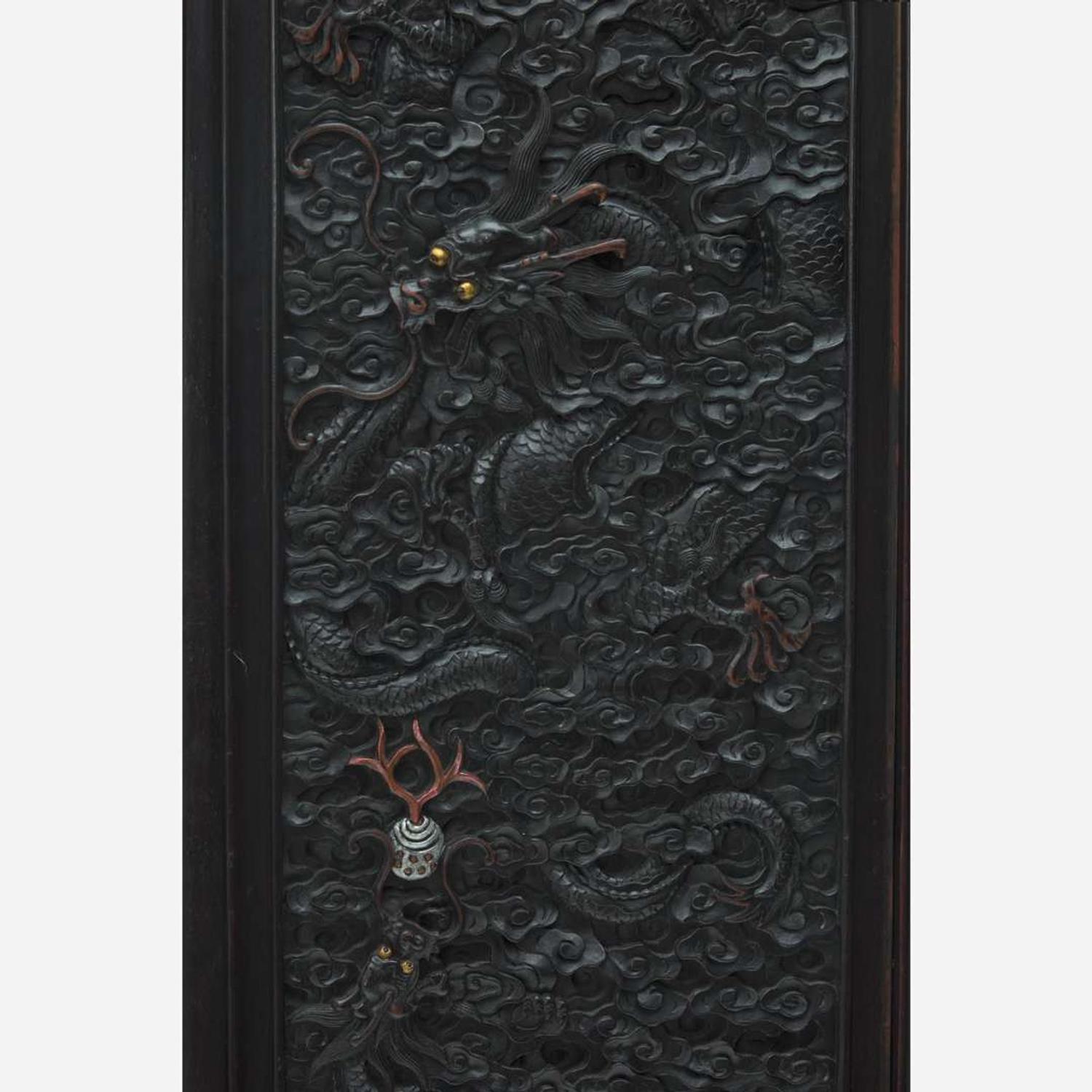 A Chinese carved hardwood six-panel “Dragons” screen 硬木浮雕龙纹六开屏风