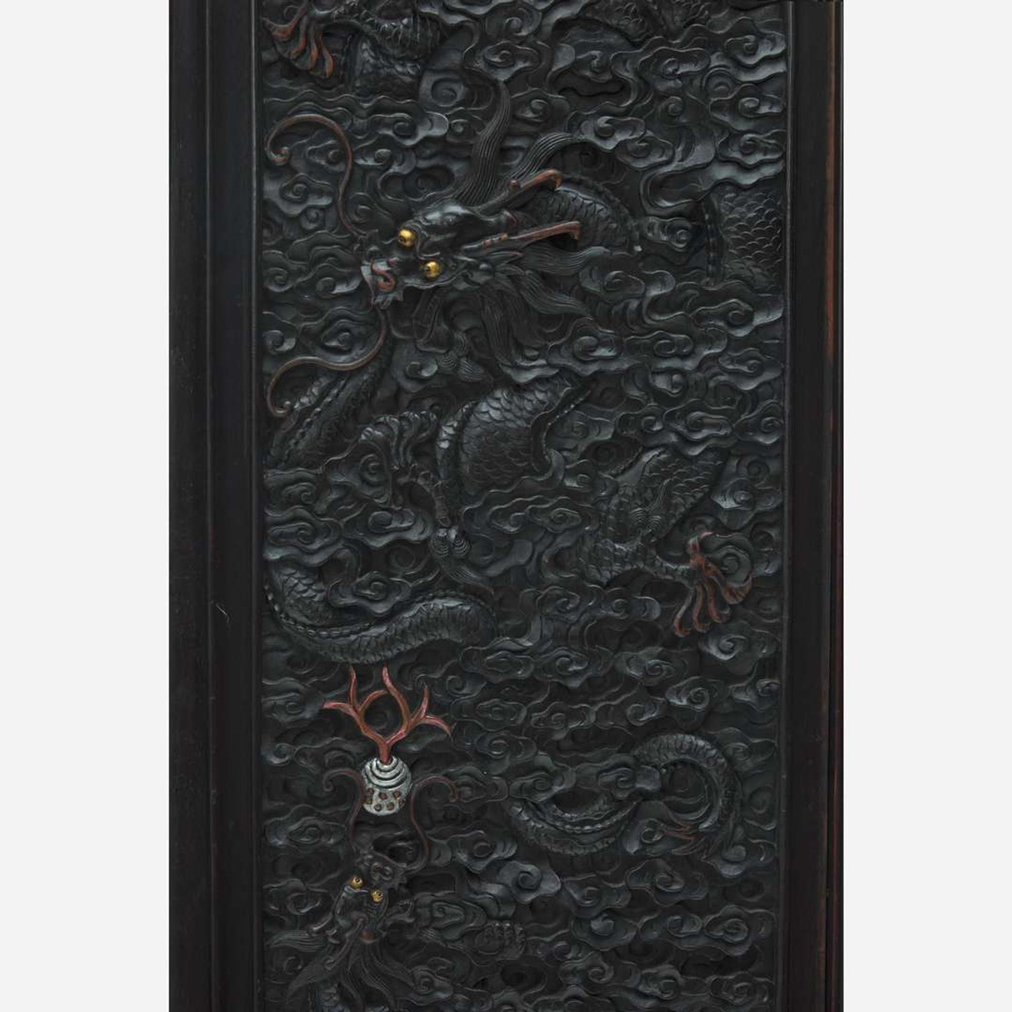 A Chinese carved hardwood six-panel “Dragons” screen 硬木浮雕龙纹六开屏风