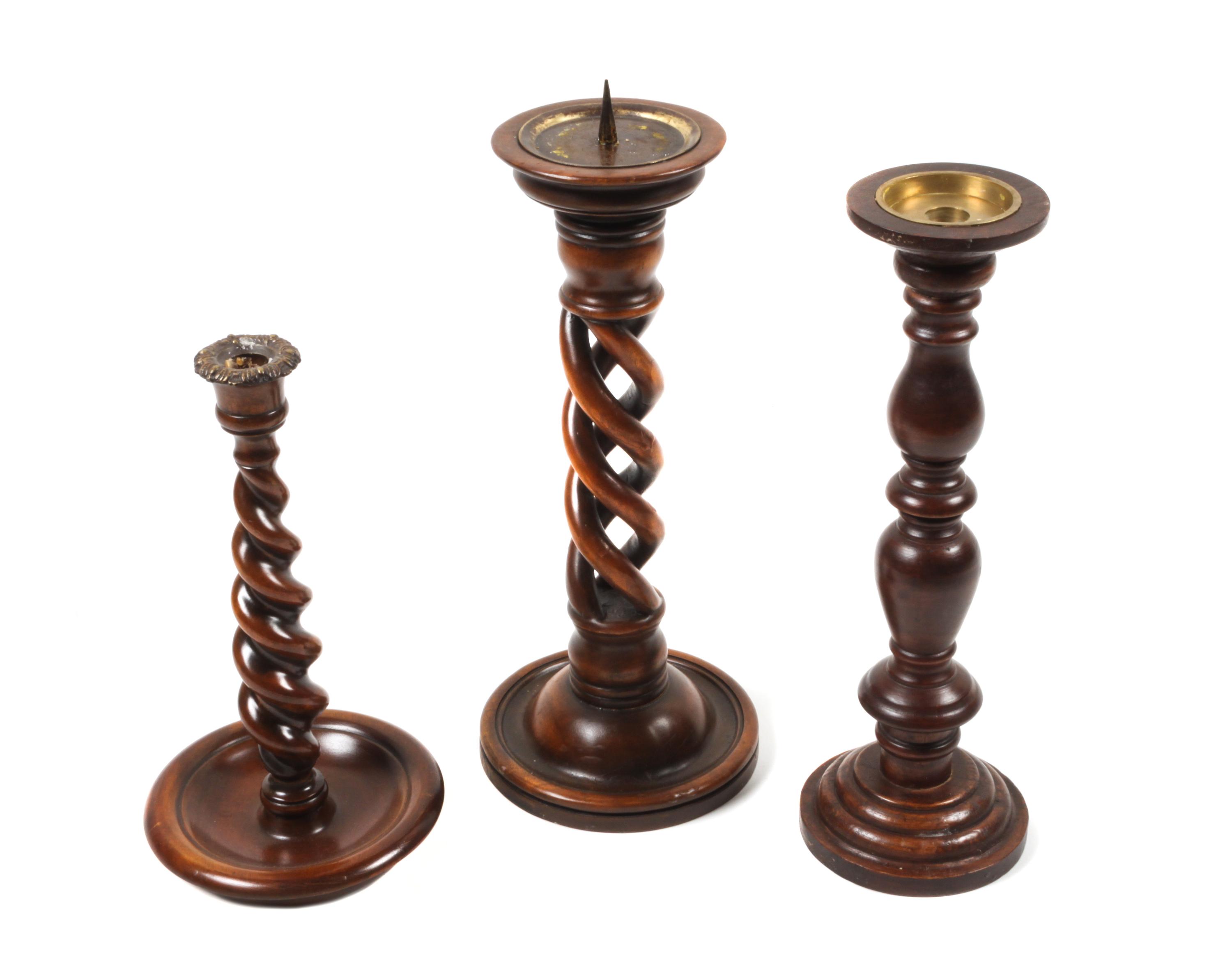Group of Three Twisted Wood Candlesticks Height of tallest 15 inches