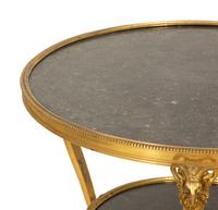 A Pair of French Empire Style Gilt Bronze and Black Marble Two Tier Gueridon Tables