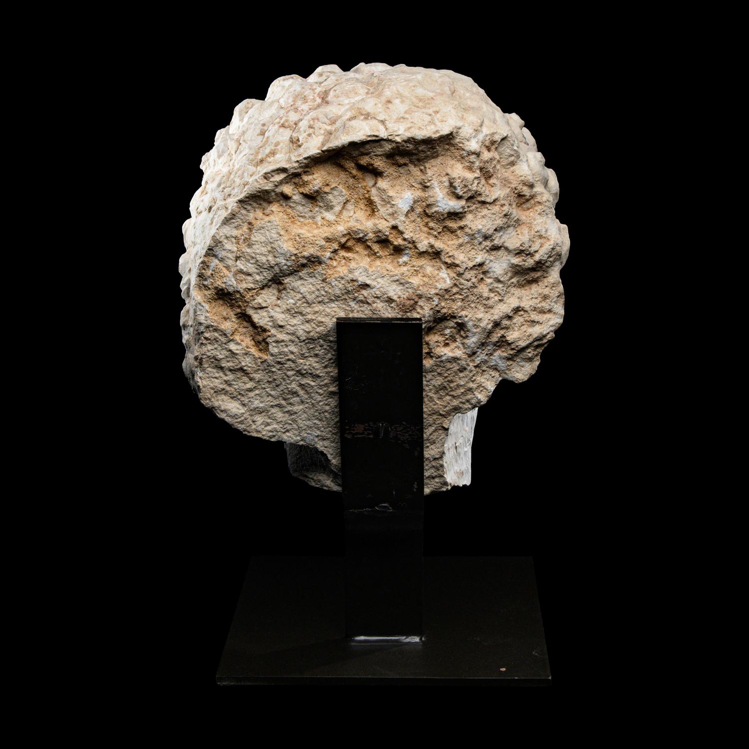 A Palmyrene Limestone Head of a Youth