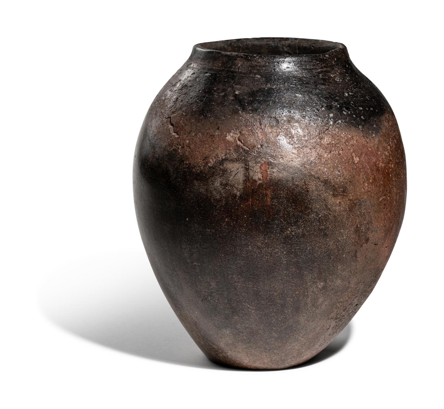 An Egyptian Black-Topped Pottery Jar