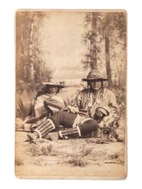 [NATIVE AMERICANS]. SAVAGE, C.R., photographer. Cabinet card of two Ute Indians. Salt Lake City, UT.