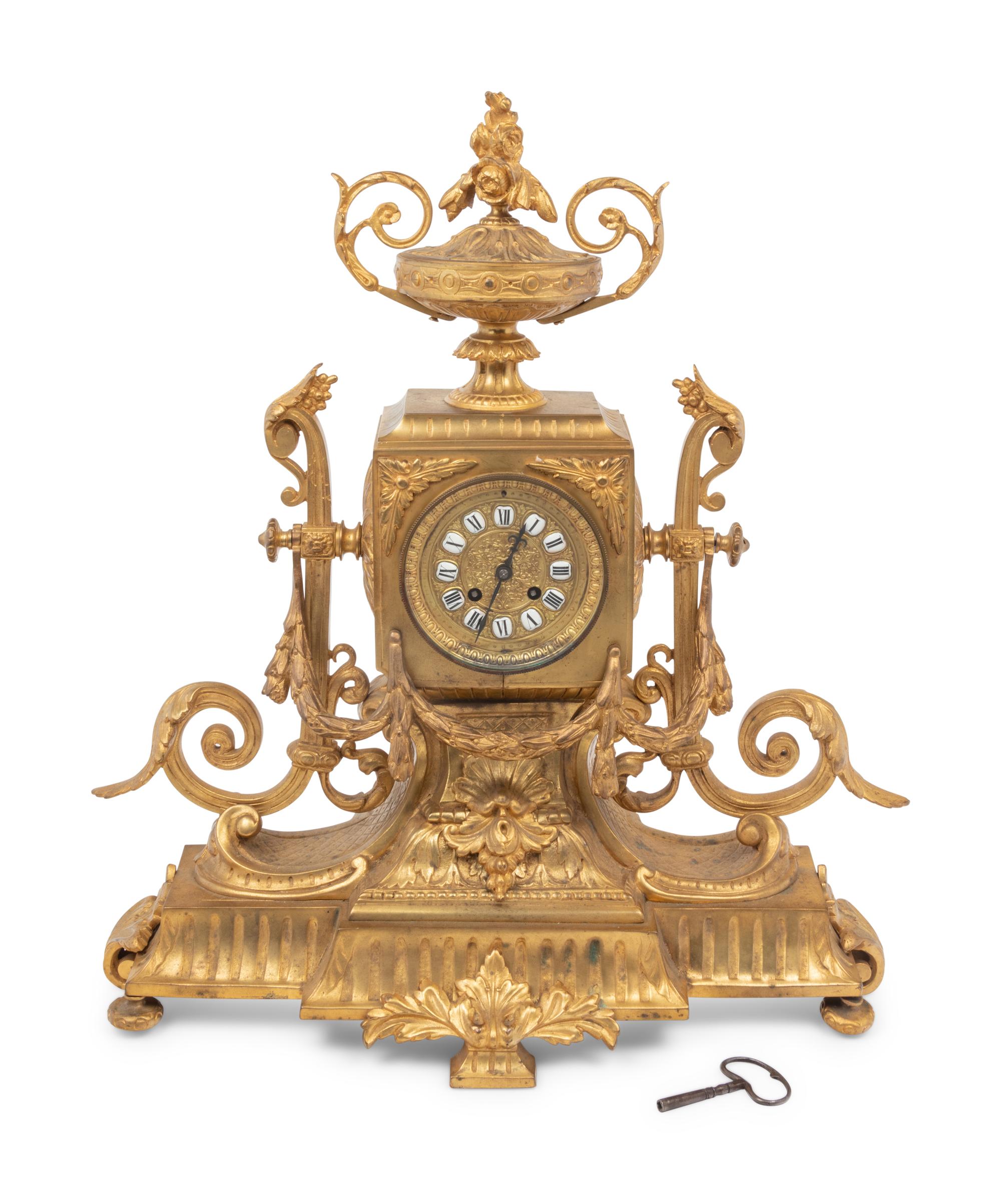A Louis XVI Style Gilt Bronze Mantel Clock