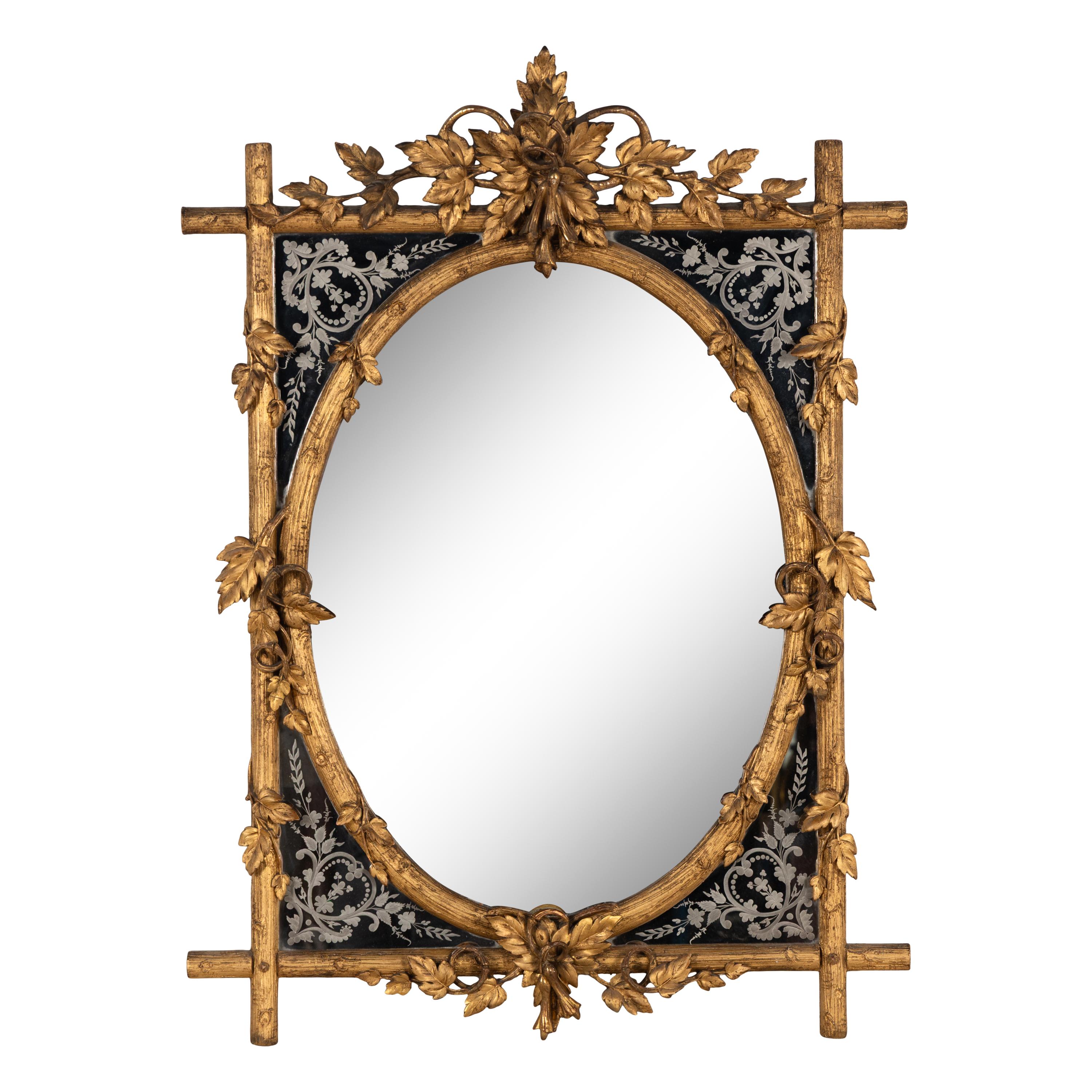 An English Giltwood, Composition and Etched Glass Mirror