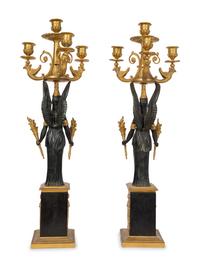 A Pair of Empire Style Gilt and Patinated Bronze Three-Light Candelabra