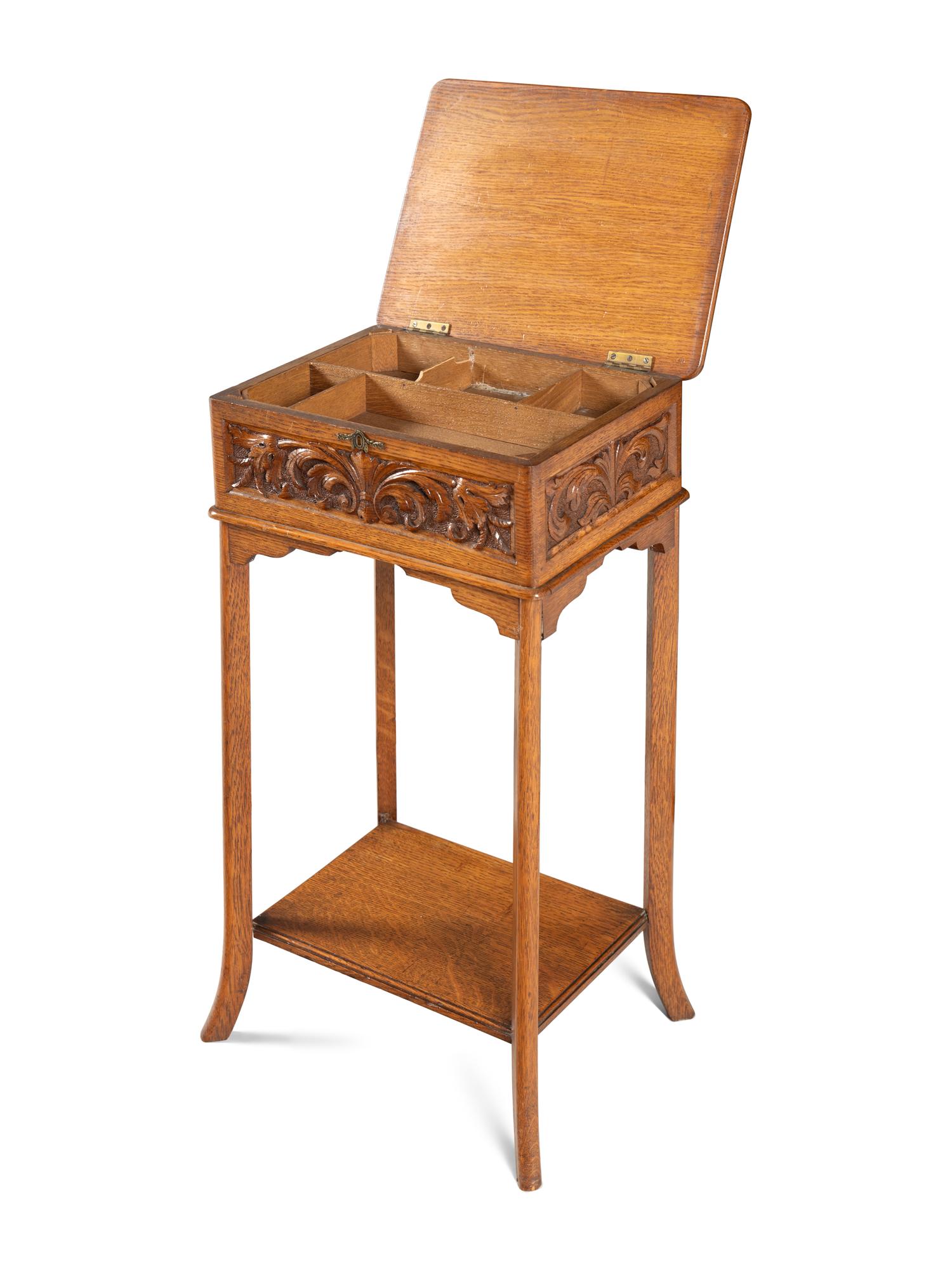 An English Carved Oak Lift Top Side Table