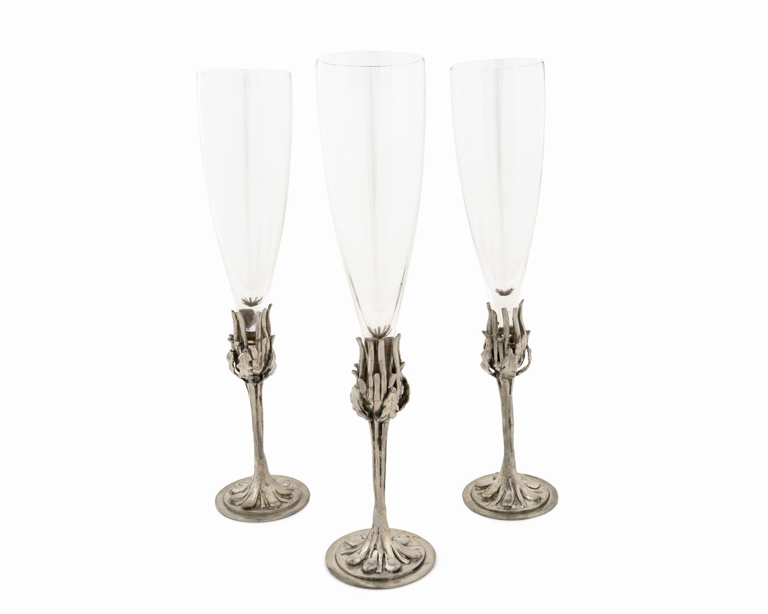 Twelve Art Nouveau Pewter Based Flutes by Castor Cooper — 20TH CENTURY