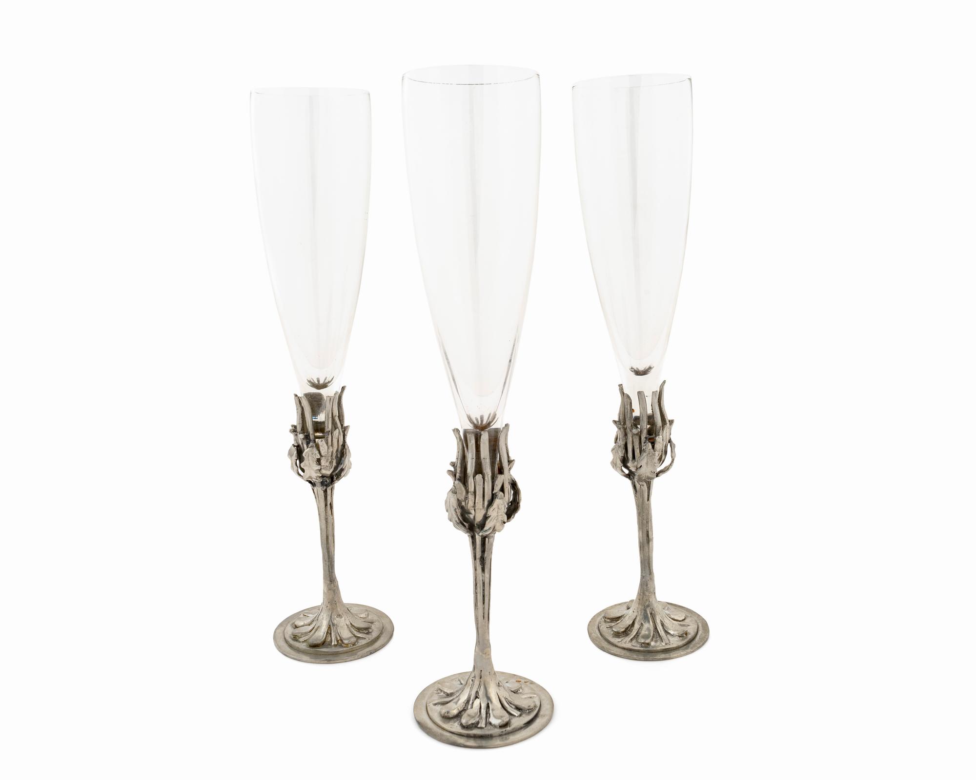 Twelve Art Nouveau Pewter Based Flutes by Castor Cooper — 20TH CENTURY