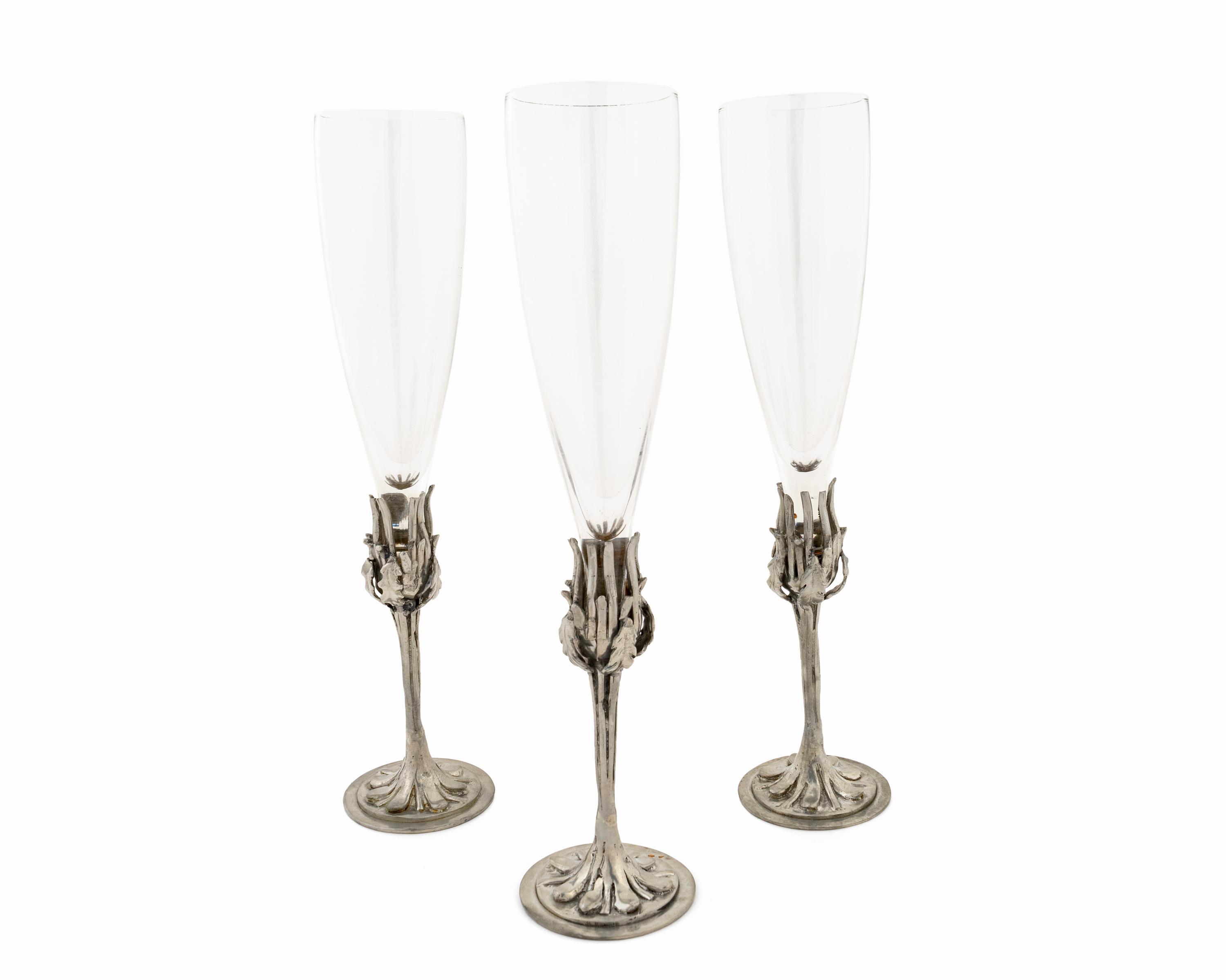 Twelve Art Nouveau Pewter Based Flutes by Castor Cooper — 20TH CENTURY