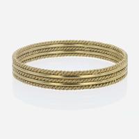 An 18K Yellow Gold Craig Drake Bangle Bracelet