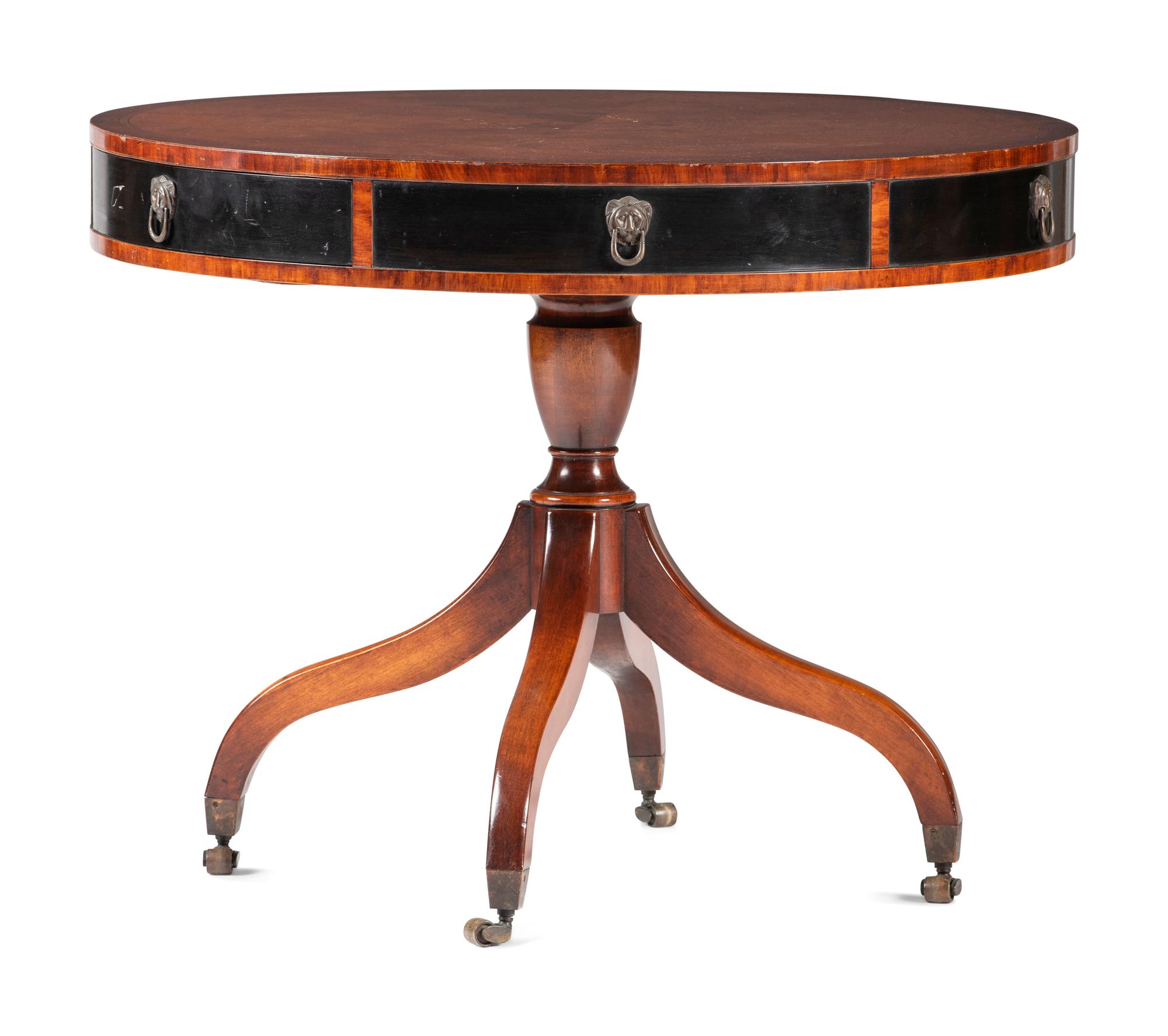 A Georgian Style Parcel Ebonized and Inlaid Burl-Walnut Drum Table