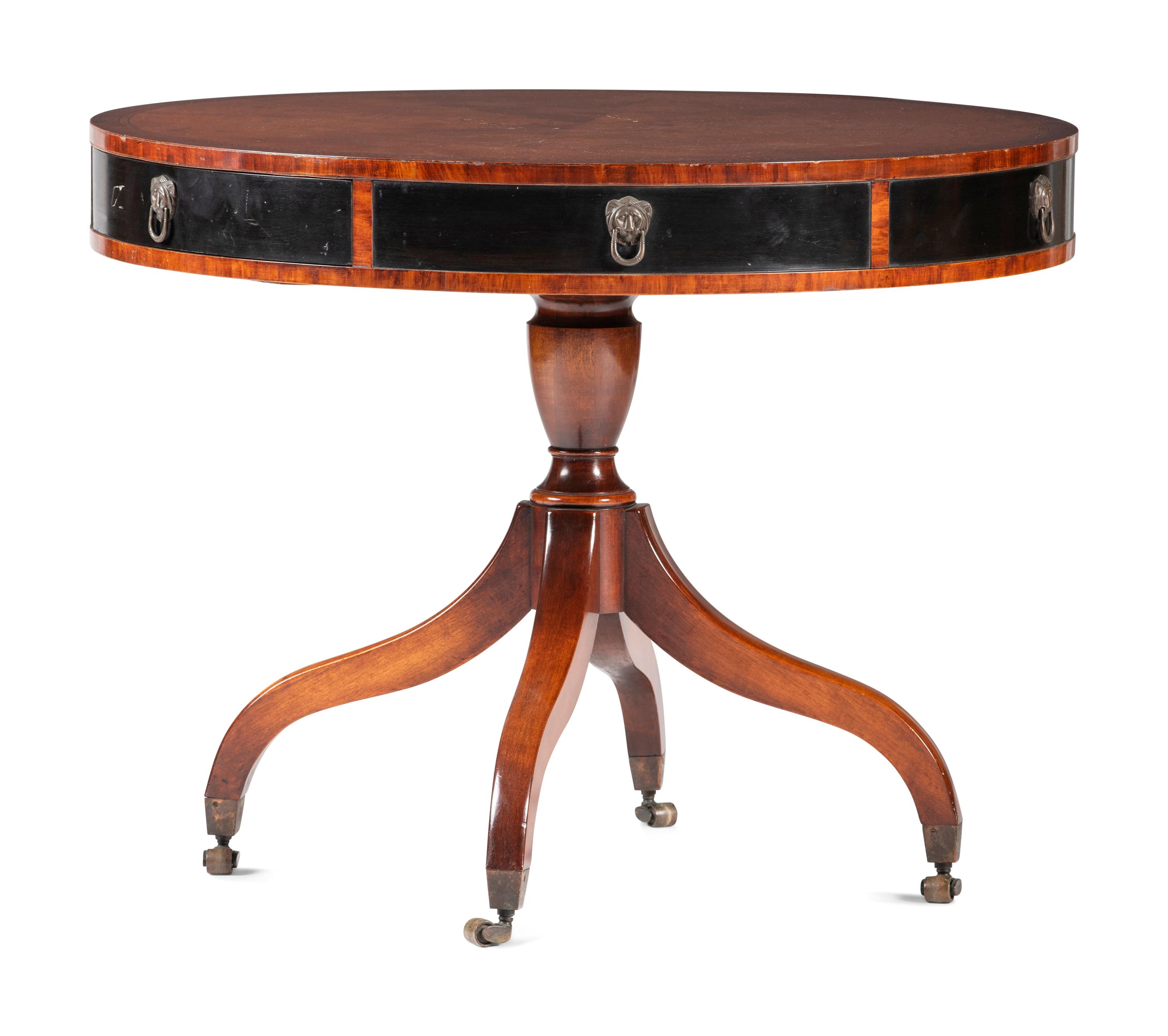 A Georgian Style Parcel Ebonized and Inlaid Burl-Walnut Drum Table