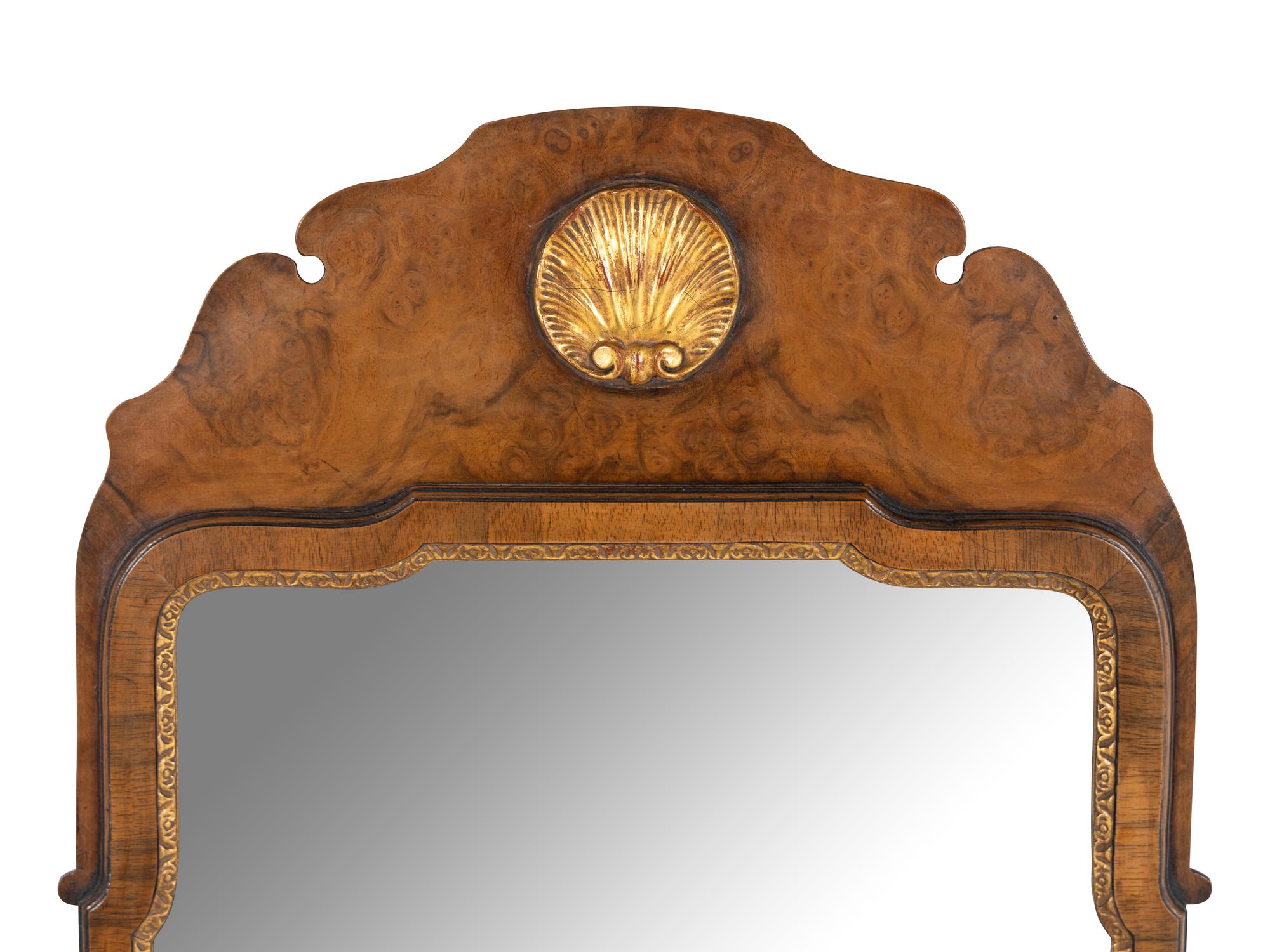 A Regency Style Parcel-Gilt Mahogany Mirror
