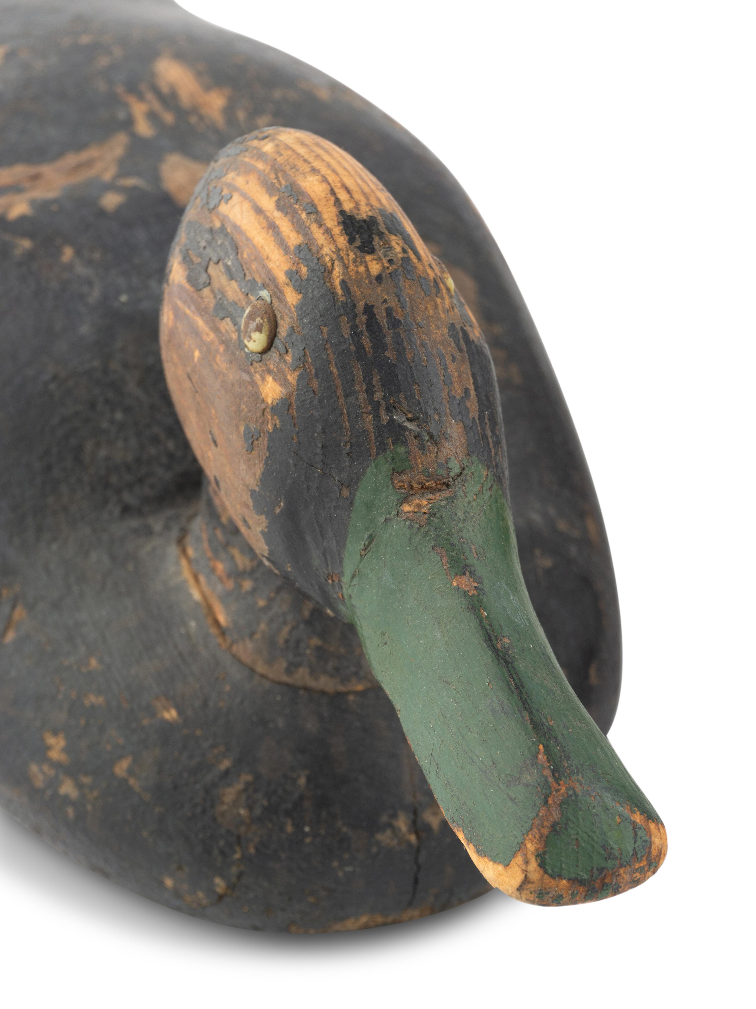 A Group of Three Wood Decoys