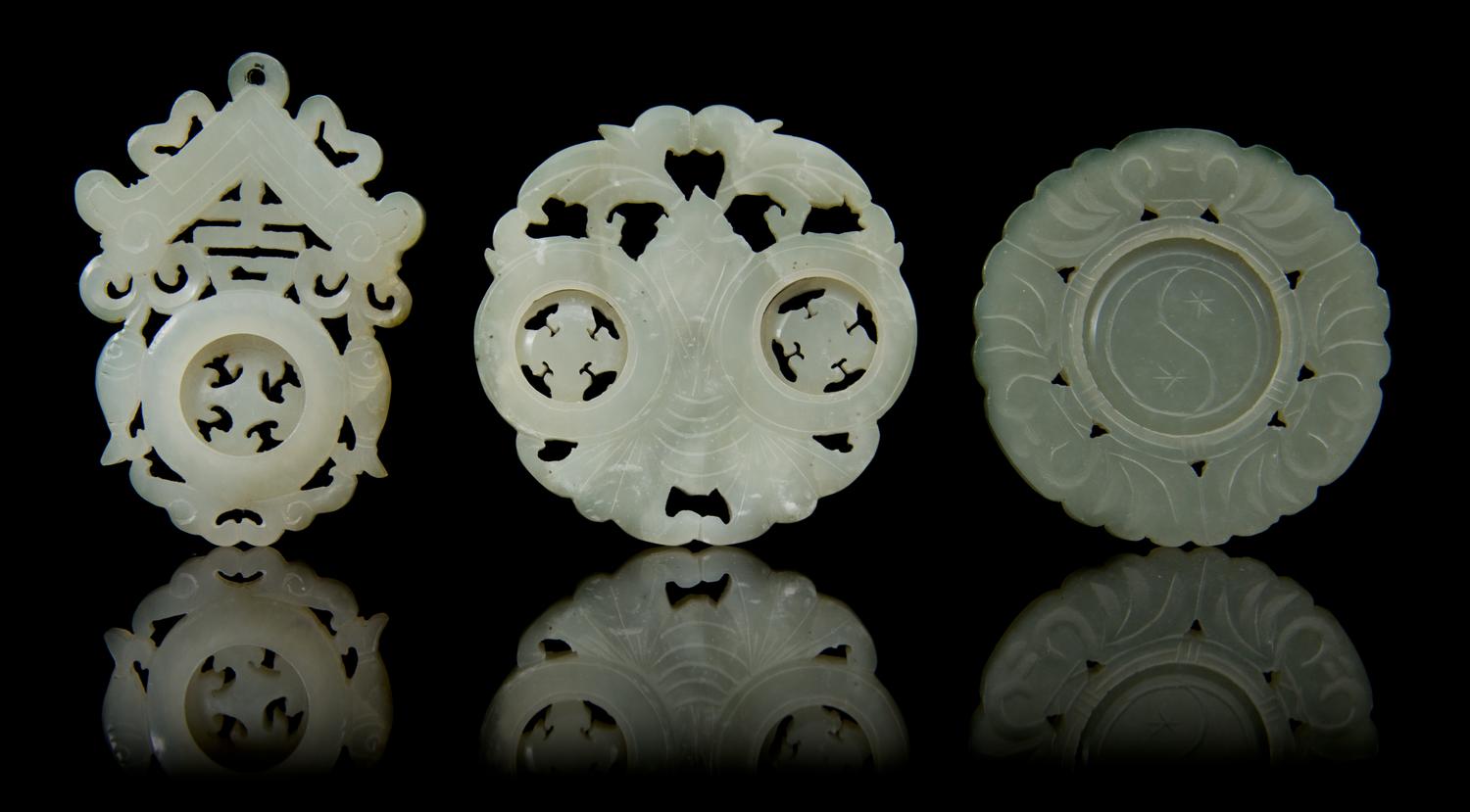 Three Carved Jade Pendants Diameter of first 2 1/8 inches.