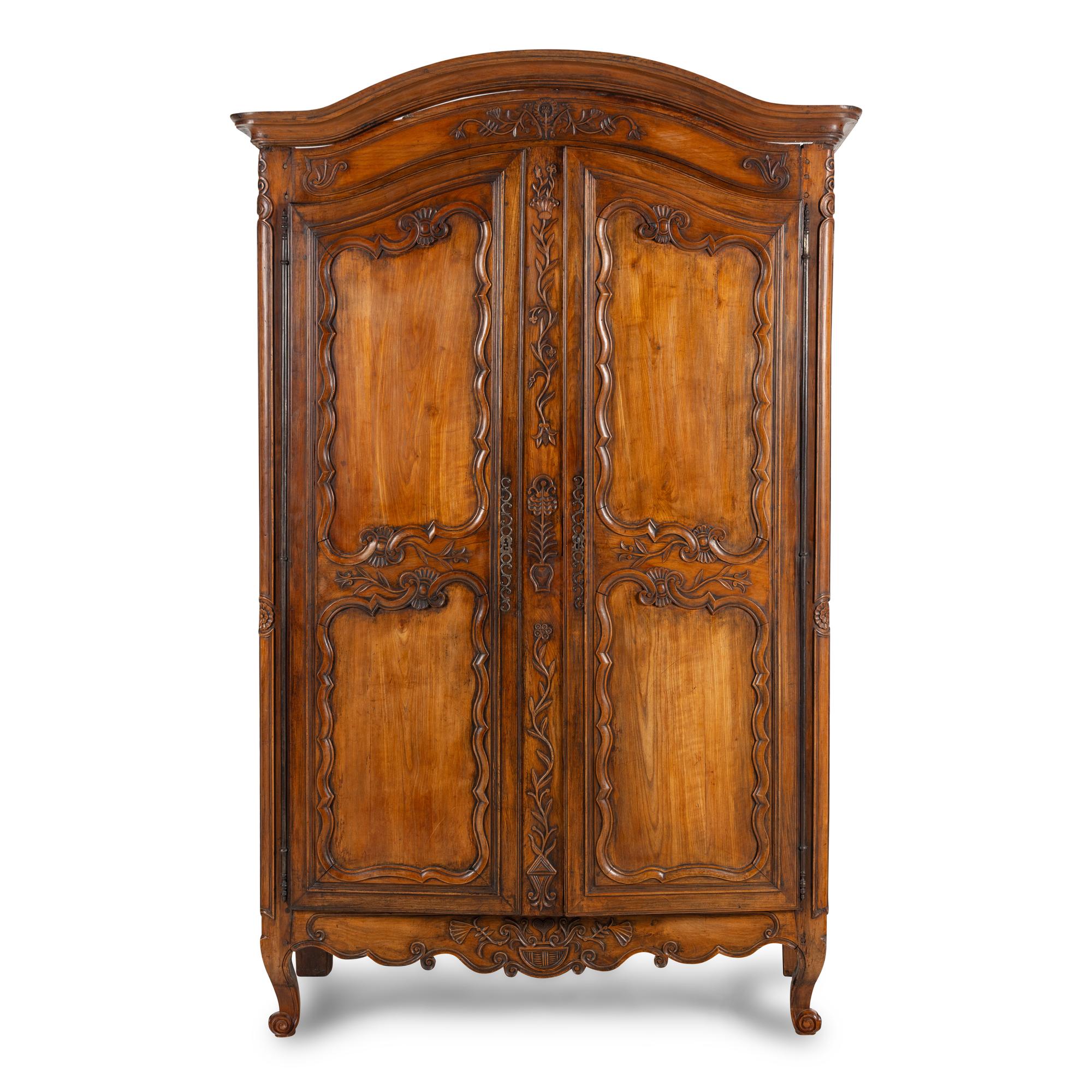 A Louis XV Provincial Walnut Armoire