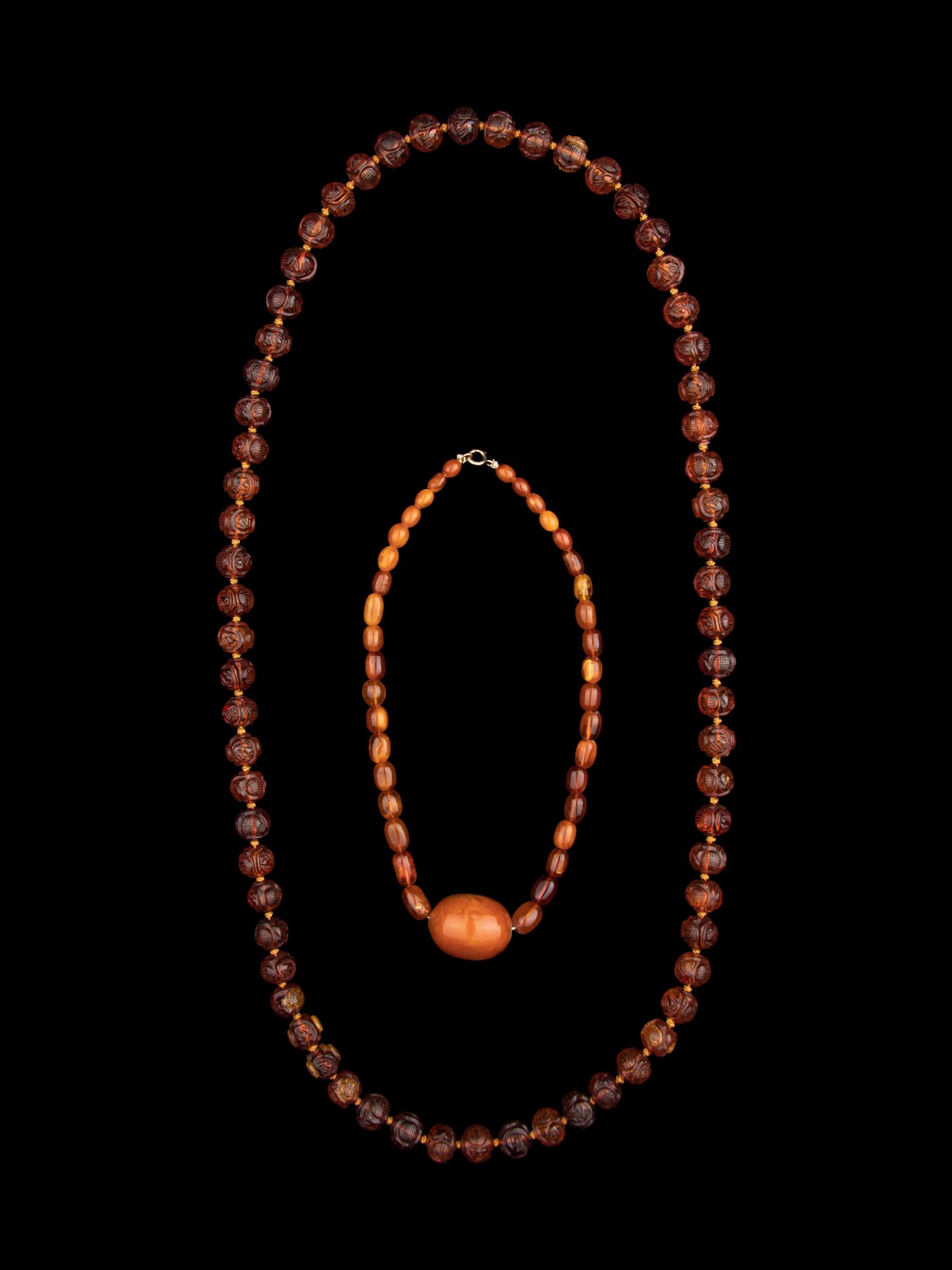 Two Chinese Amber Beaded Necklaces