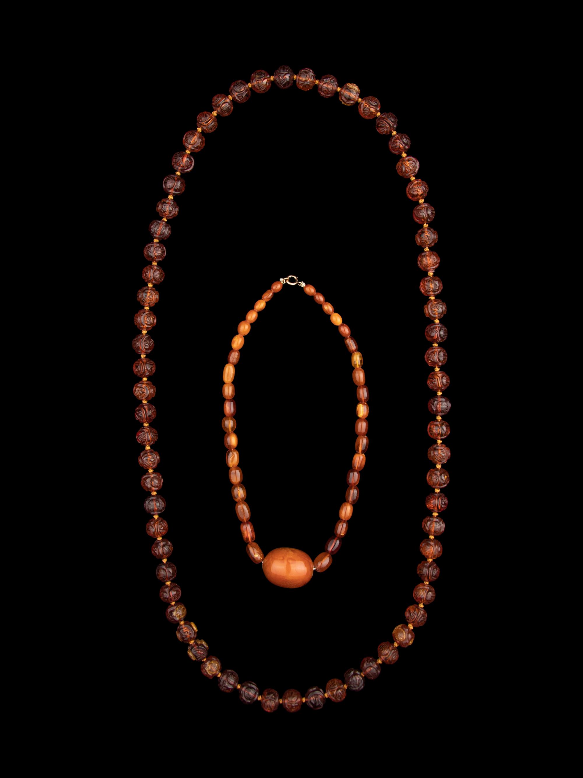 Two Chinese Amber Beaded Necklaces