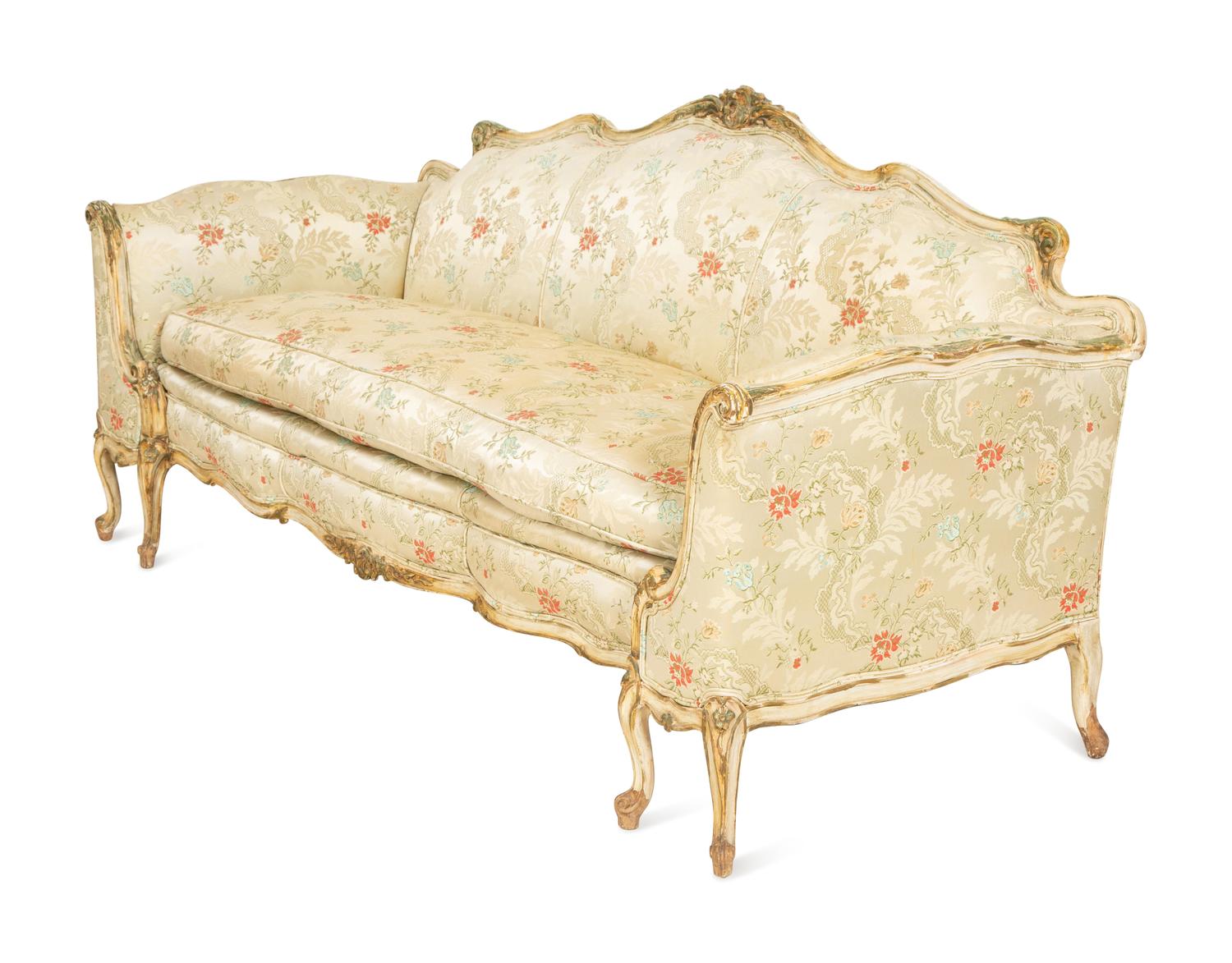 A Louis XV Style Painted and Parcel Gilt Sofa
