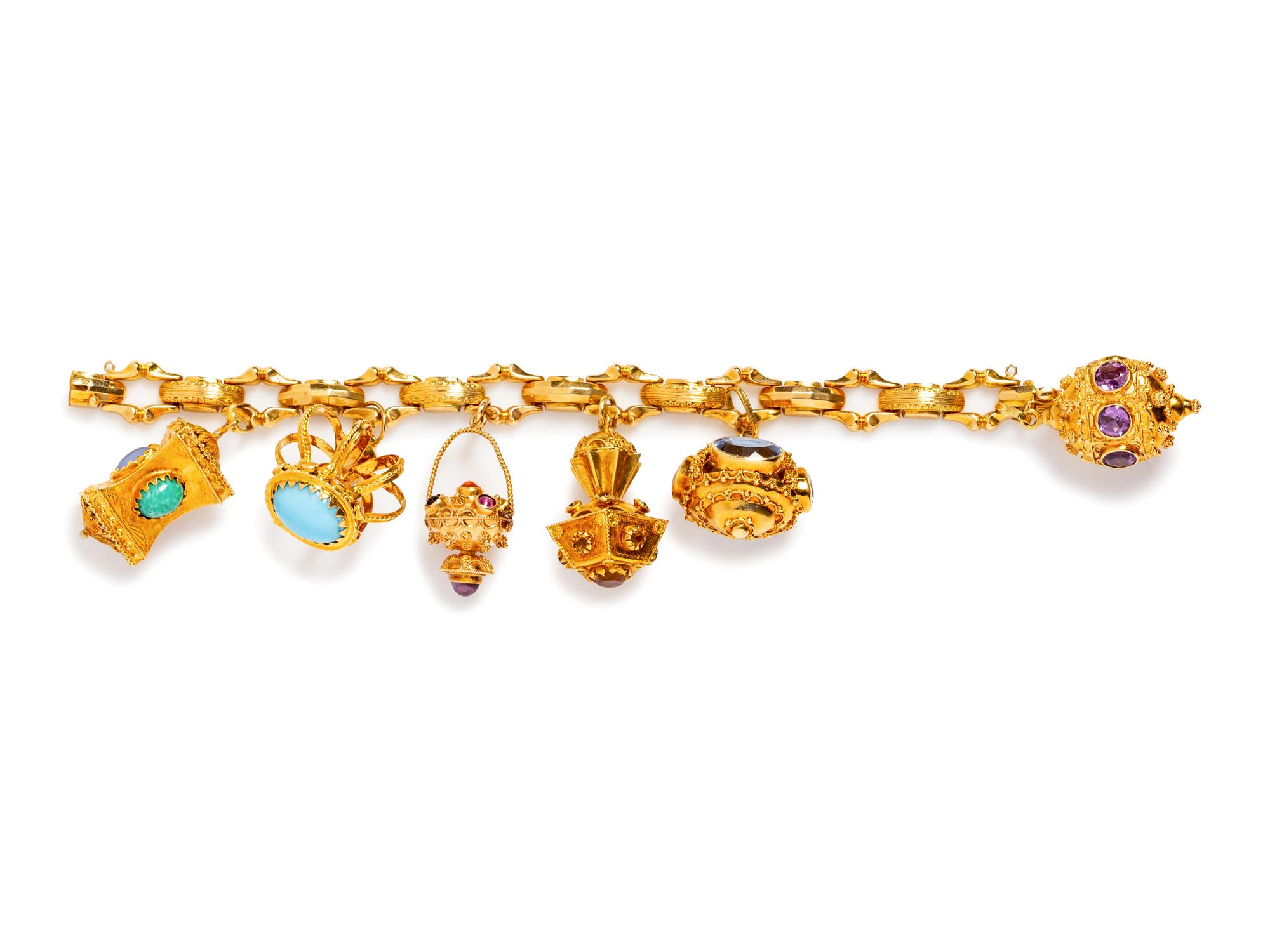 A Yellow Gold and Gemstone Charm Bracelet,