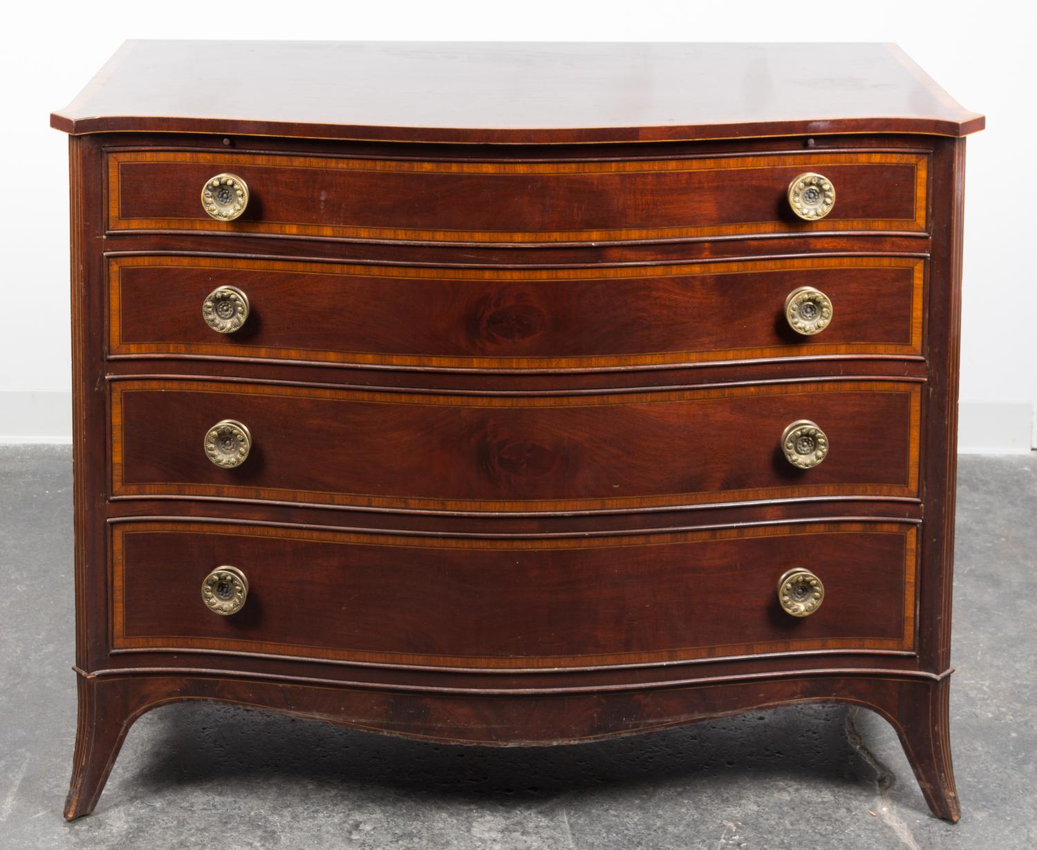 A Regency Style Chest of Drawers Height 36 3/4 x width 46 1/4 x depth 21 1/2 inches.