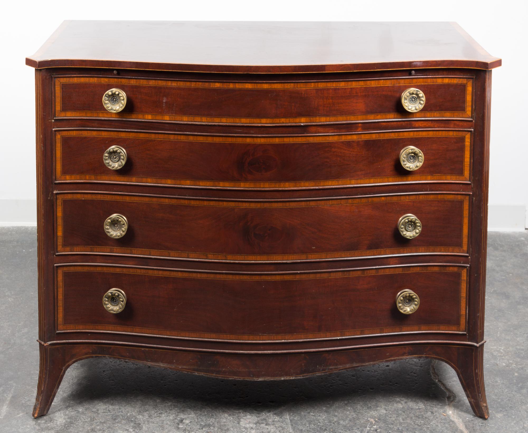 A Regency Style Chest of Drawers Height 36 3/4 x width 46 1/4 x depth 21 1/2 inches.