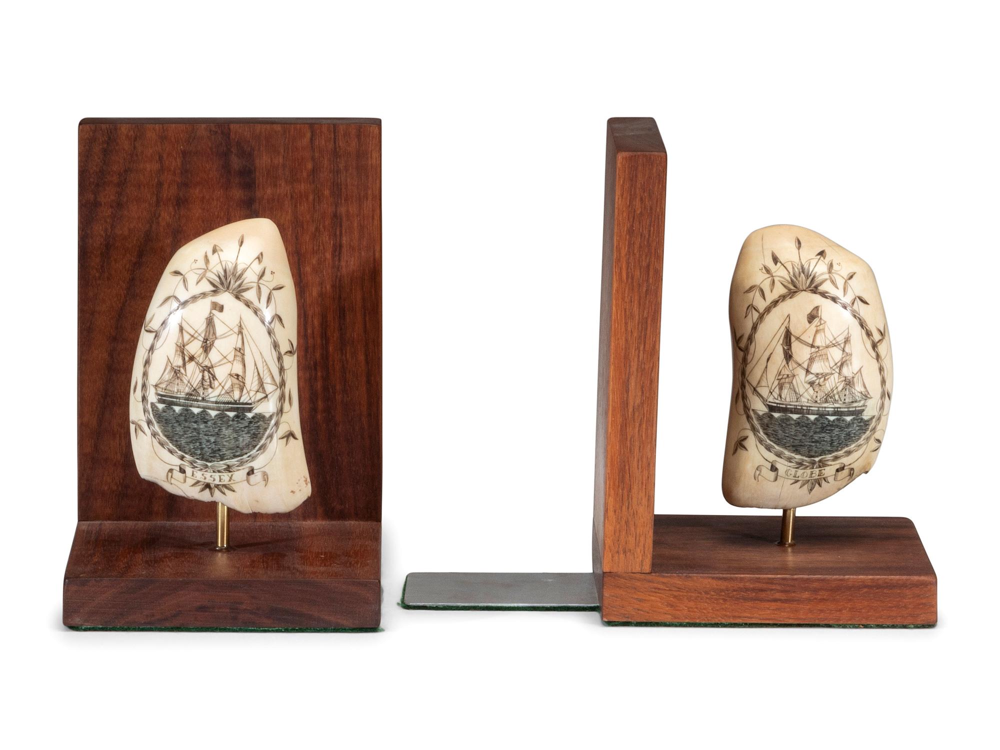 A Pair of Robert Spring Scrimshaw Whale's Teeth