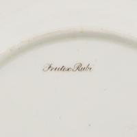 A Set of Seven English Porcelain Dessert Plates