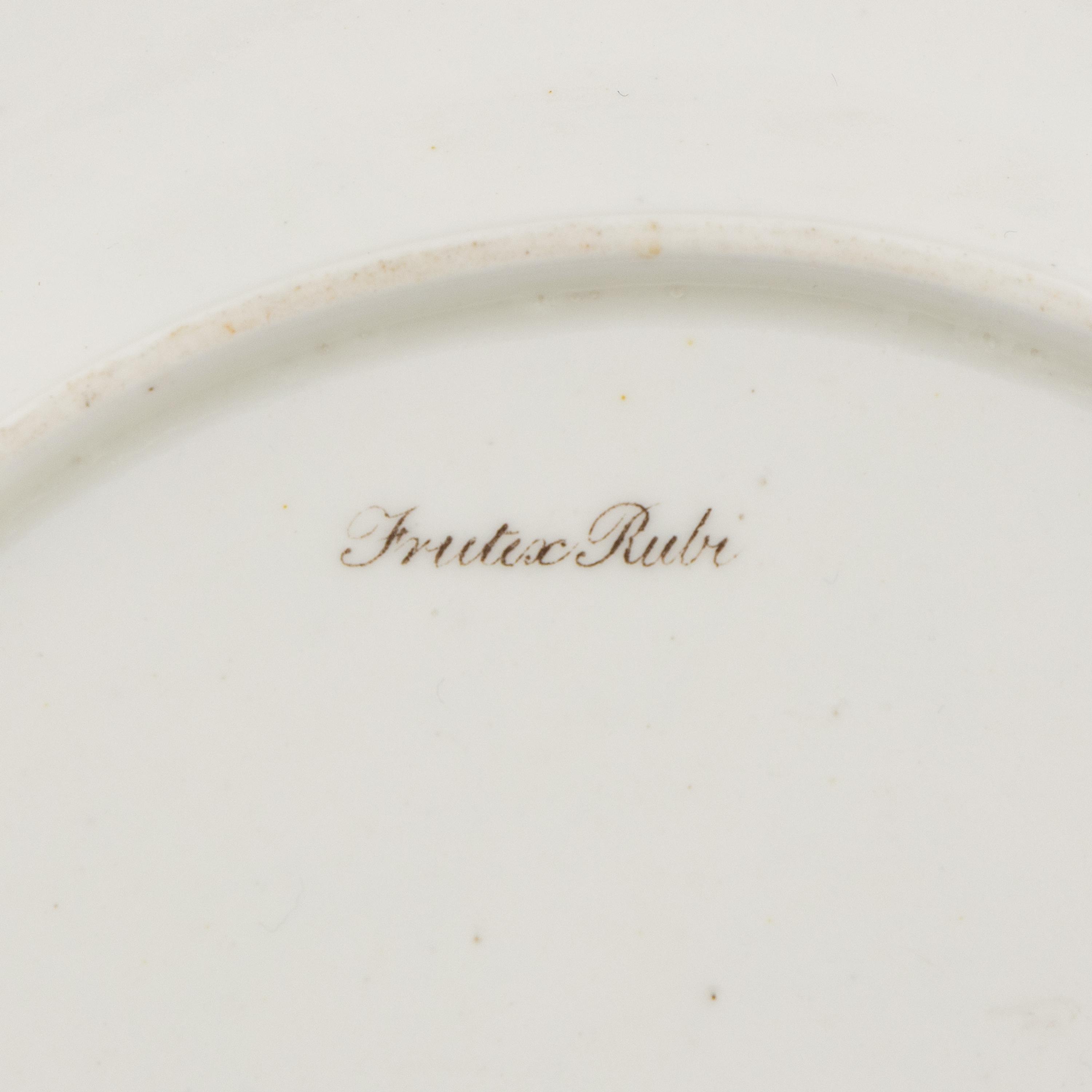 A Set of Seven English Porcelain Dessert Plates