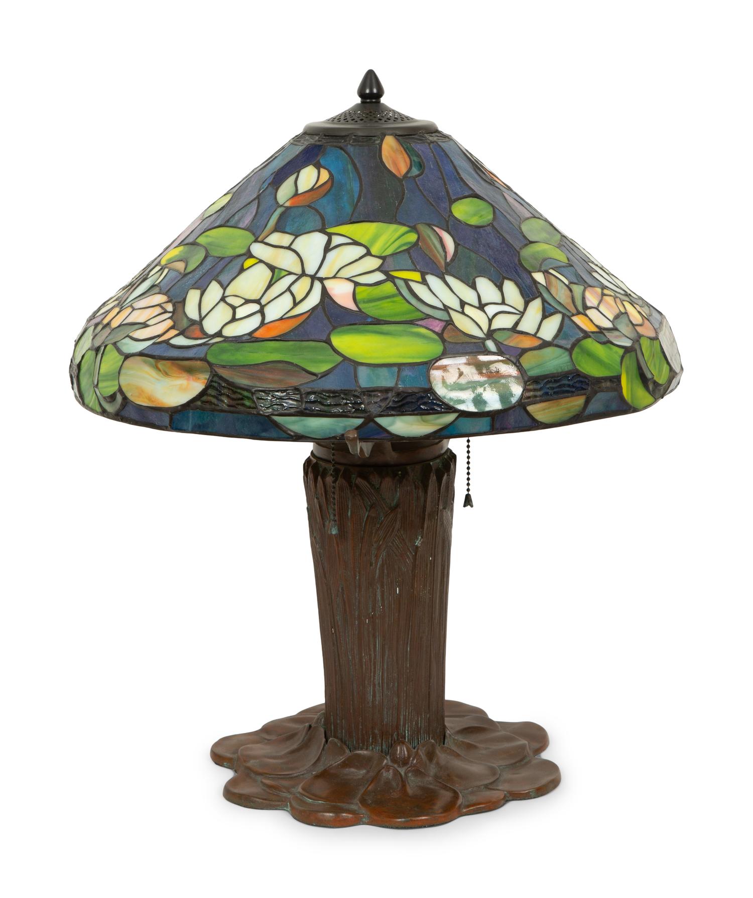 A Gilbertson's Studio Leaded Glass and Bronze Water Lily Lamp