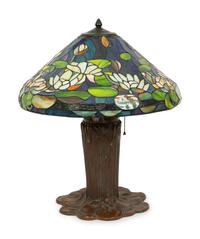 A Gilbertson's Studio Leaded Glass and Bronze Water Lily Lamp