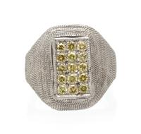 A White Gold and Colored Diamond Ring, 4.60 dwts.