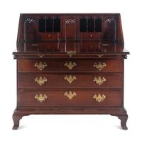 A Chippendale Shell-Carved Mahogany Slant-Front Desk