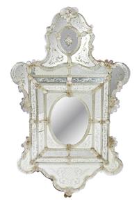 A Venetian Glass Mirror Height 66 1/4 inches.