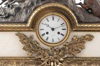 A French Parcel-Gilt Bronze Mounted Marble Mantel Clock