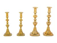Four English Diamond Pattern Brass Candlesticks