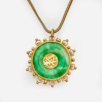 A 22K Yellow Gold and Jadeite Pendant on a 14K Yellow Gold Chain