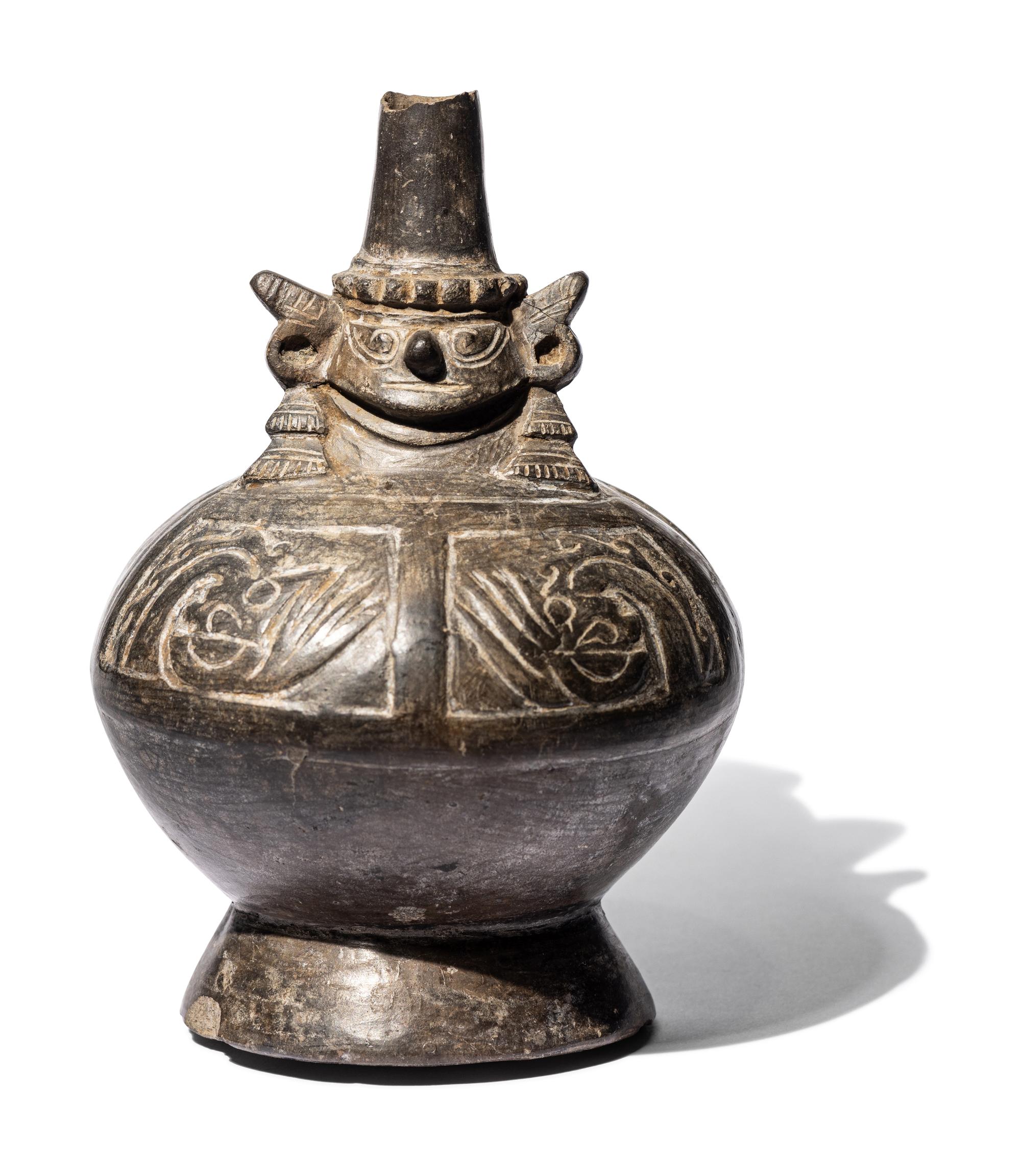 A Sican Blackware Stirrup Vessel
