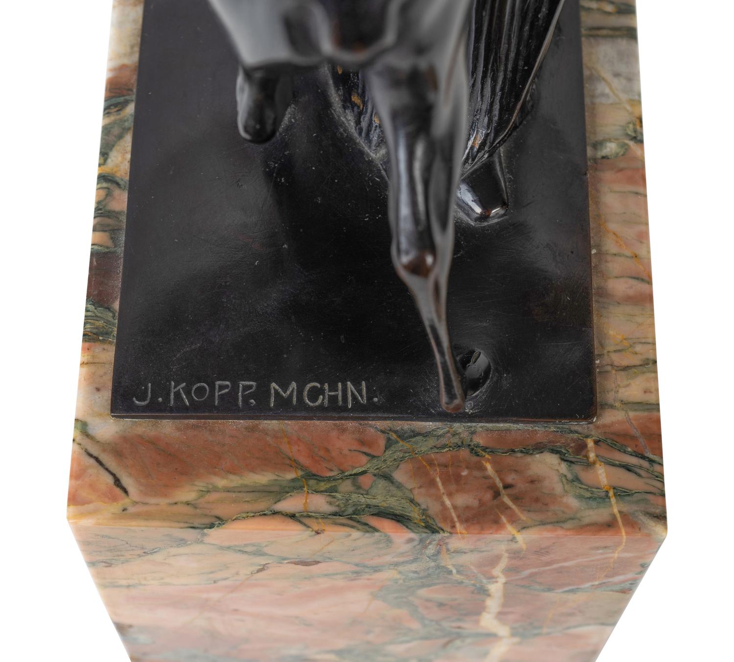 A Figural Group on a Marble Base