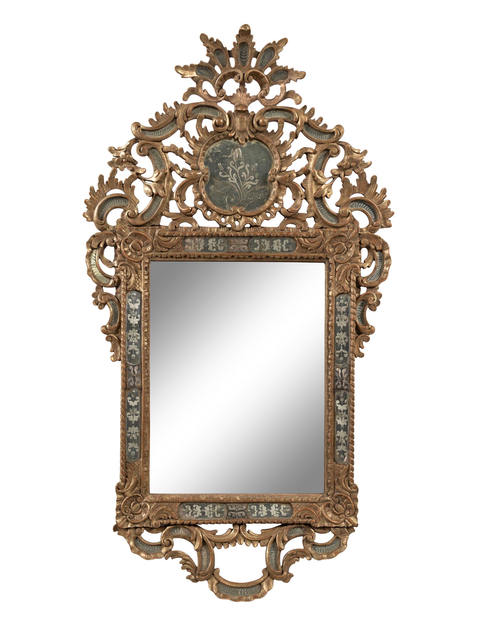 A Continental Giltwood and Etched Glass Mirror