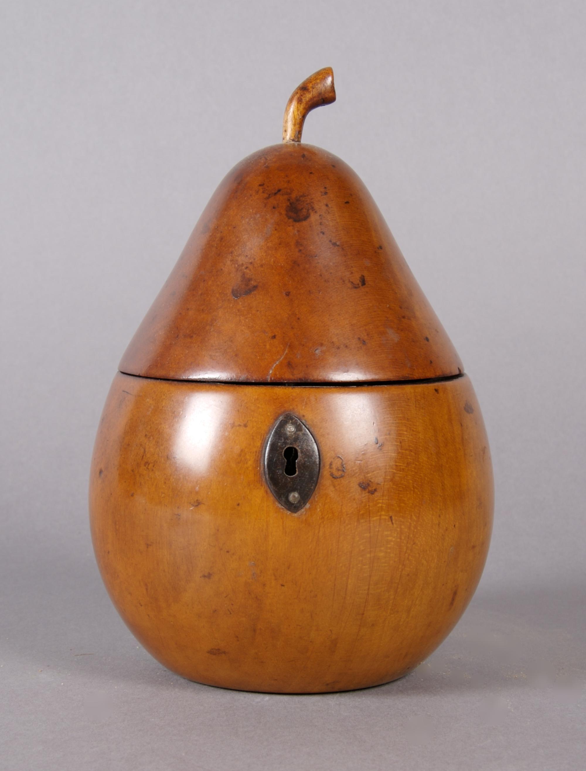 An English Fruitwood Tea Caddy, Height 6 5/8 inches.