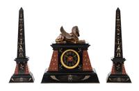 A French Egyptian Revival Three-Piece Clock Garniture Height of obelisk 20 1/4 inches. — 19TH/20TH CENTURY